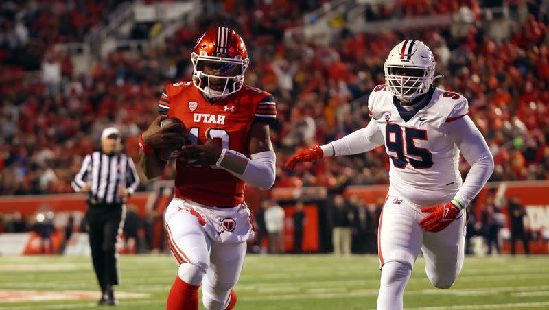 Utah backup quarterback Nate Johnson takes the ball to the end zone as the Utes and Arizona play at Rice-Eccles Stadium in Salt Lake City on Saturday, Nov. 5, 2022. Johnson is among a small group of quarterbacks battling for QB2 duties.