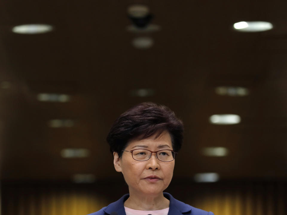 Hong Kong Chief Executive Carrie Lam listens to questions during a press conference in Hong Kong, Tuesday, July 9, 2019. Lam said Tuesday the effort to amend an extradition bill was dead, but it wasn't clear if the legislation was being withdrawn as protesters have demanded. (AP Photo/Vincent Yu)