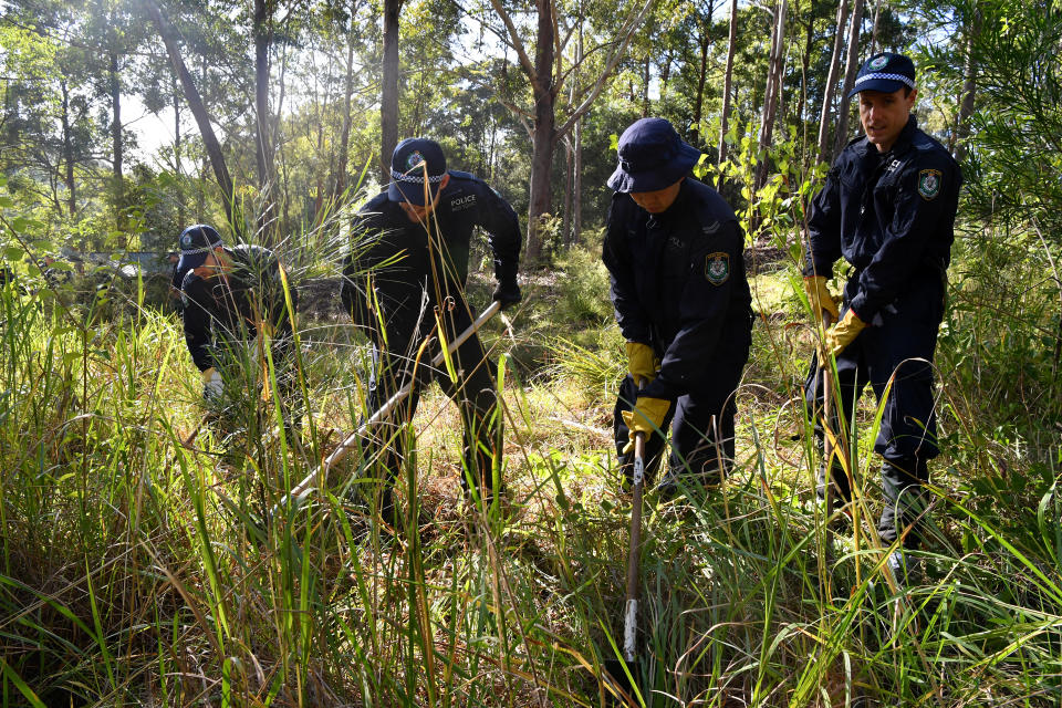 A child’s toy is one of several items discovered in Kendall bushland, with about 50 officers searching the area on Thursday. Source: AAP