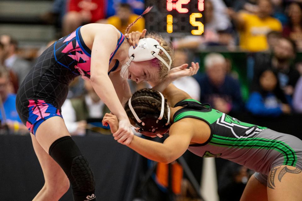 Washburn Rural's Molly Spader wrestles Derby's Amara Ehsa 6-5A 105 weight class state title on Saturday, Feb. 24, 2024.