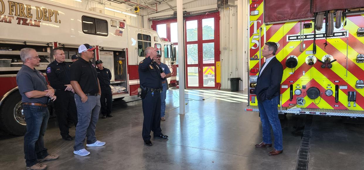 U.S. Rep. Ronny Jackson looks on Wednesday morning as first responders talk about their needs for equipment and training during a stop at Amarillo Fire Station No. 5.