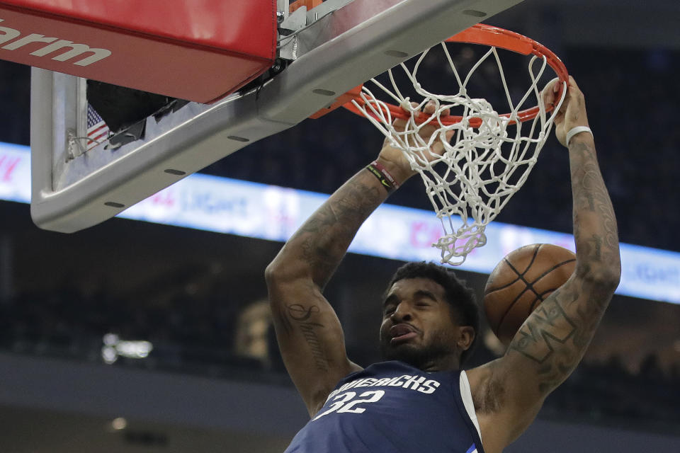 Dallas Mavericks' Marquese Chriss dunks during the first half of an NBA basketball game against the Milwaukee Bucks, Sunday, April 3, 2022, in Milwaukee. (AP Photo/Aaron Gash)