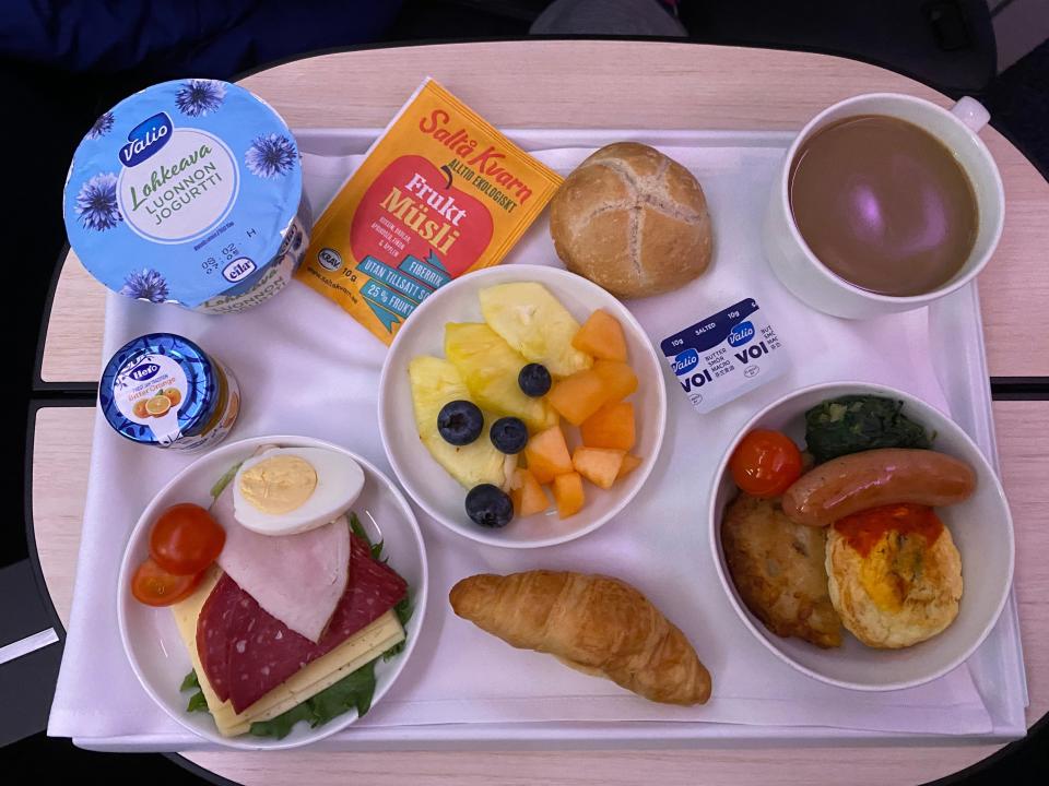 Breakfast spread for Finnair business class seat on flight to Bangkok freelancer photo