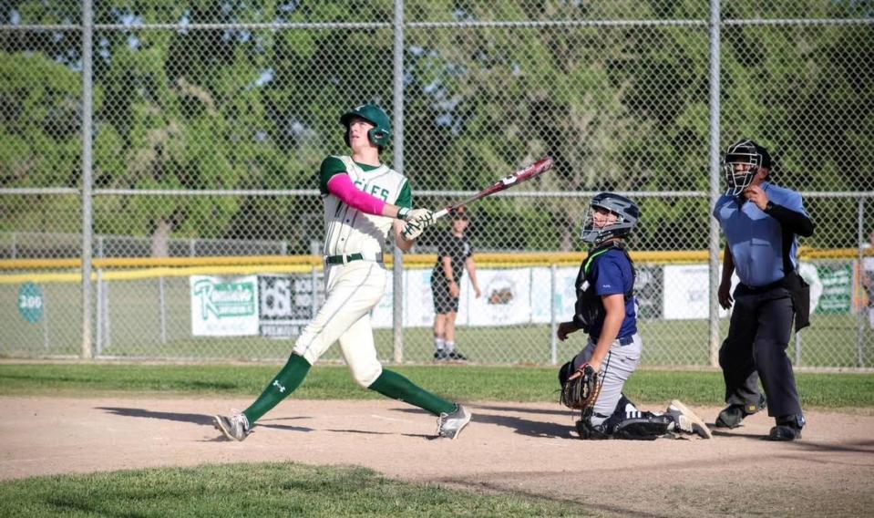 Quincy Winkler connects with a pitch at Templeton High. Winkler will play baseball at Cal Poly next year.