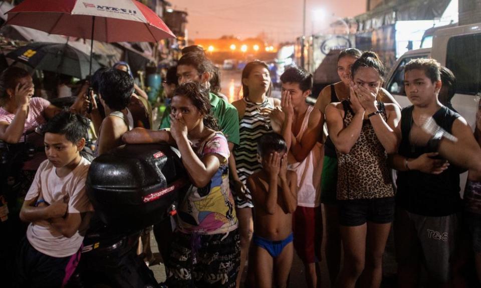 Manila residents react to the killings of three alleged drug dealers in a 2016 police raid.