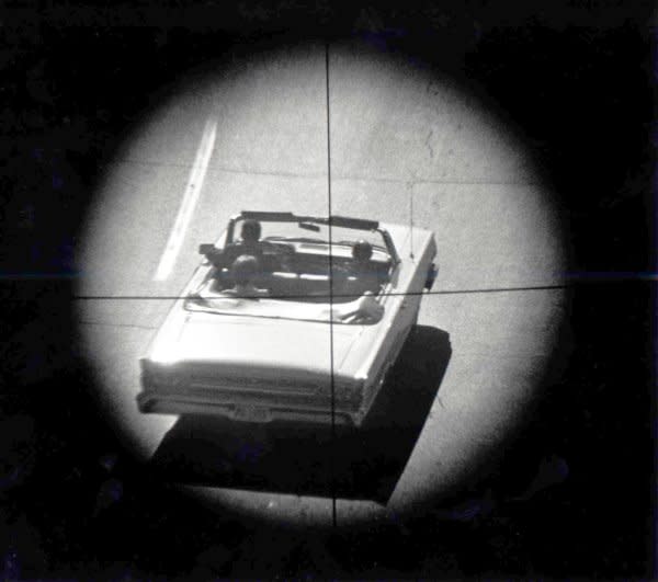 A re-enactment of the assassination of President John F. Kennedy, using a four-power telescopic gunsight mounted with a 35mm camera, illustrates approximately what the assassin saw when he fired the fatal shots on November 22, 1963. The re-enactment was conducted on December 4, 1963. UPI File Photo
