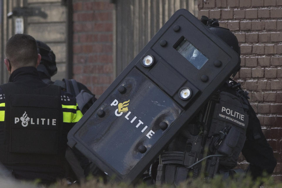 Dutch counter terrorism police prepare to enter a house after a shooting incident in Utrecht, Netherlands, Monday, March 18, 2019. (Photo: Peter Dejong/AP)