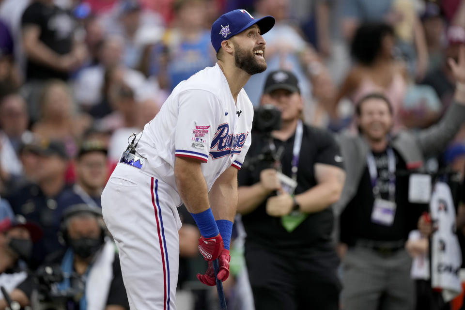 American League's Joey Gallo, of the Texas Rangers, watches his ball take flight during the first round of the MLB All Star baseball Home Run Derby, Monday, July 12, 2021, in Denver. (AP Photo/David Zalubowski)