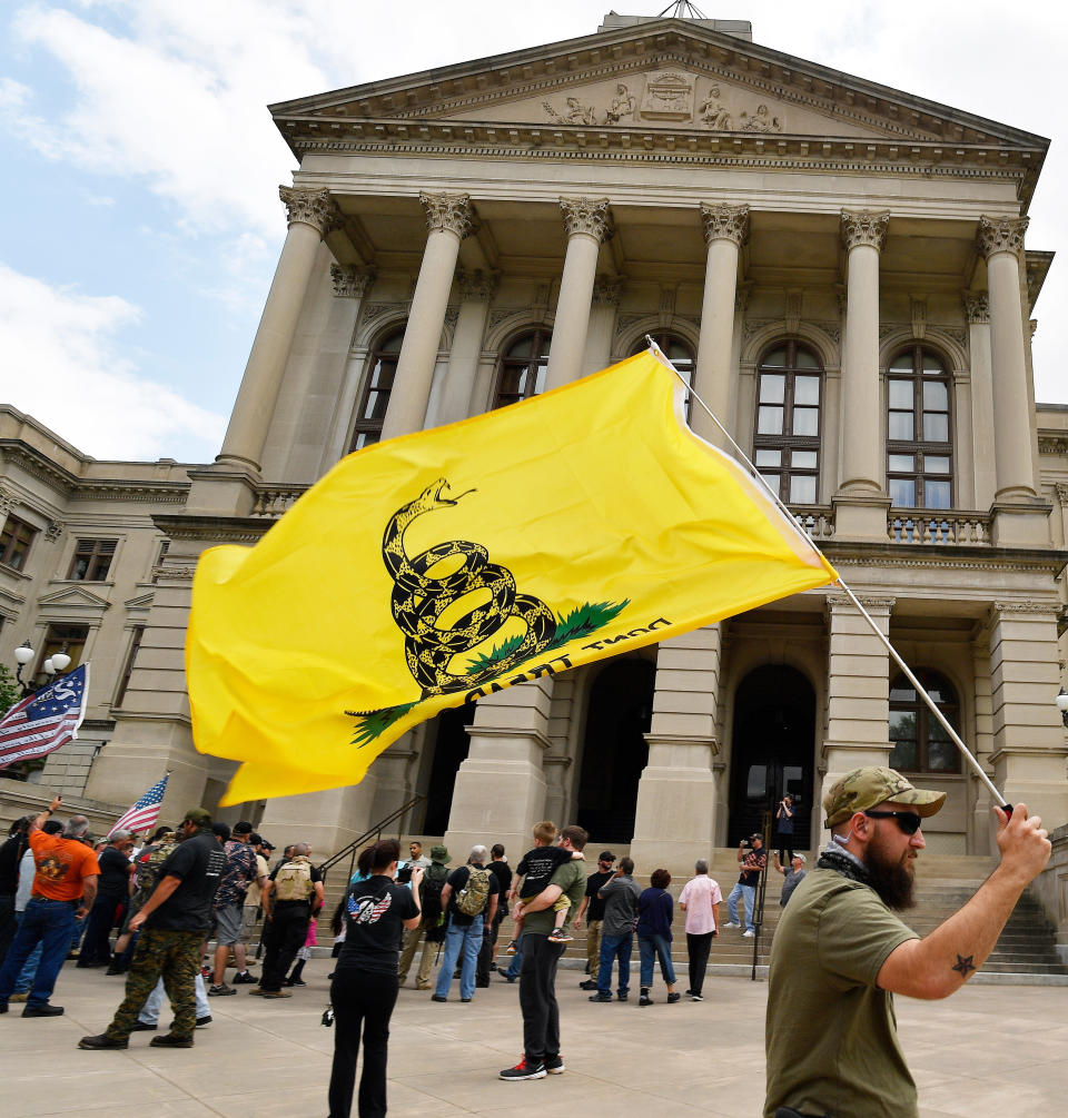 <p>People participate in a gun-rights rally at the state capitol, Saturday, April 14, 2018, in Atlanta, Ga. (Photo: Mike Stewart/AP) </p>