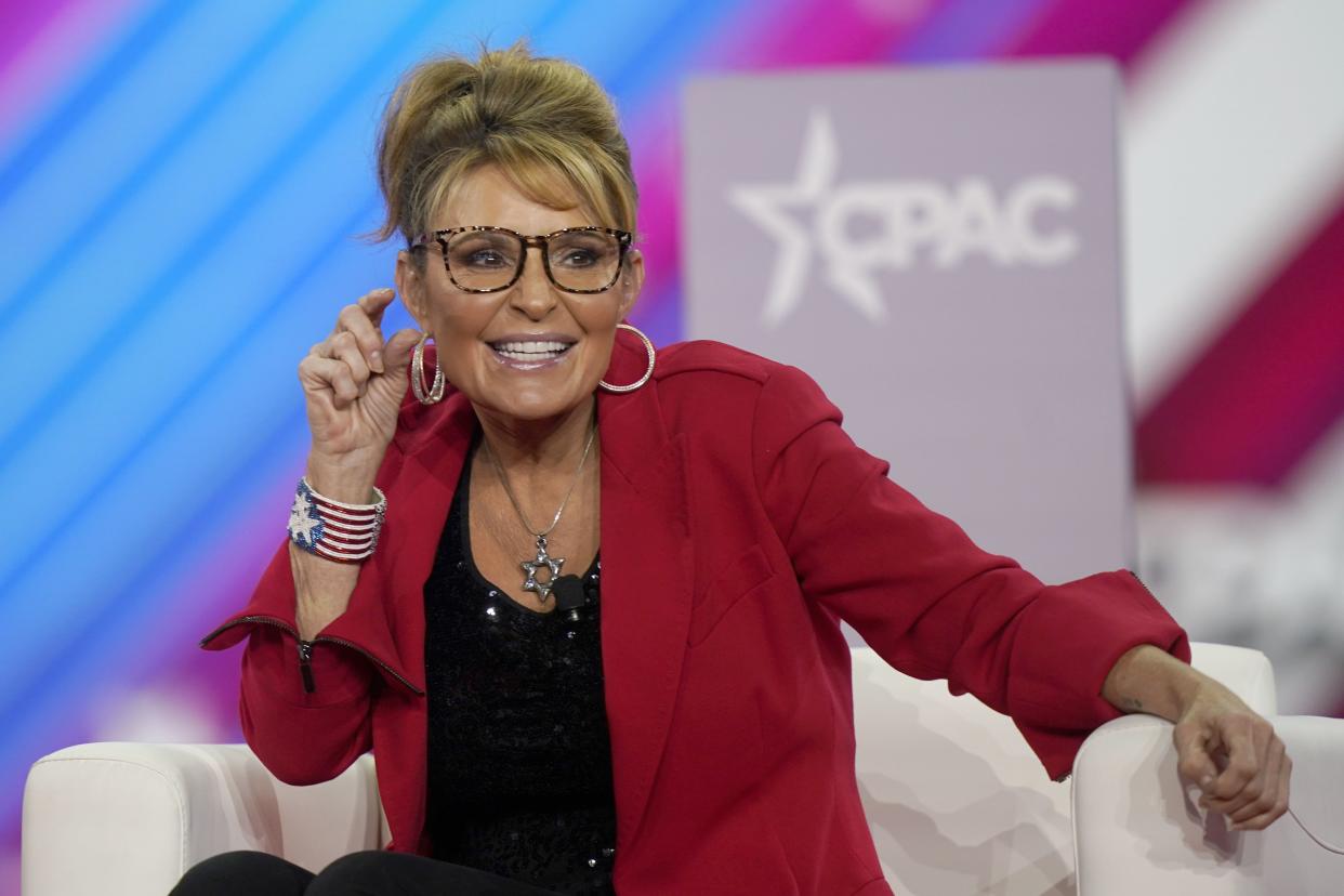 FILE - Former Alaska Gov. Sarah Palin makes a joke about the size of the state of Texas compared to Alaska during her appearance at the Conservative Political Action Conference (CPAC) in Dallas, Aug. 4, 2022. 