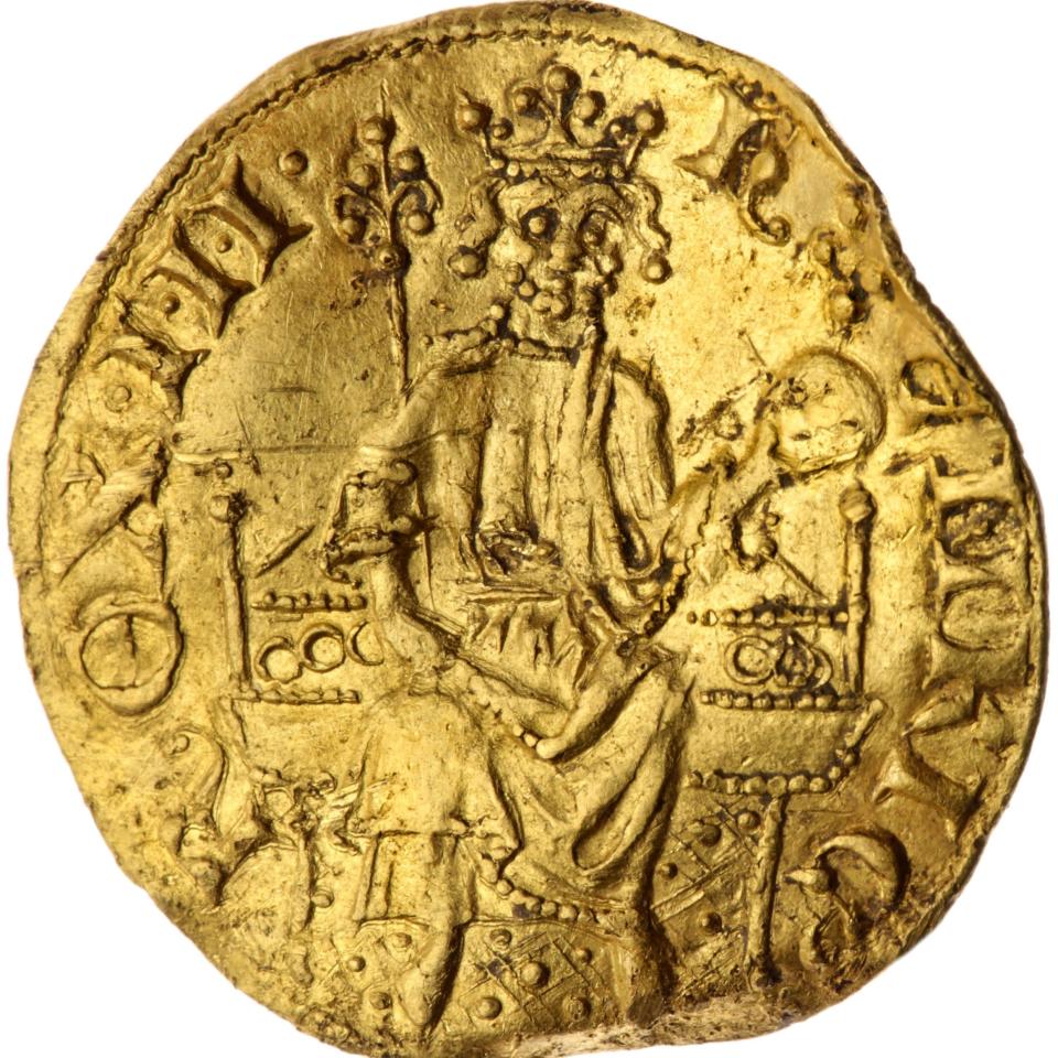 Detail from the coin, showing the king with his orb and sceptre