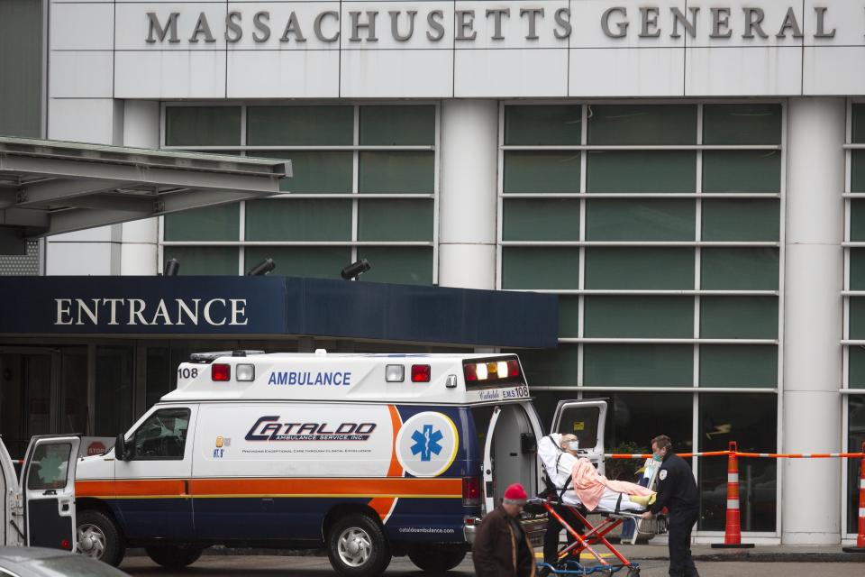 FILE - A patient arrives at the Massachusetts General Hospital emergency entrance, Friday, April 3, 2020, in Boston. Doctors in Boston say they have transplanted a genetically modified pig kidney into a 62-year-old patient. Massachusetts General Hospital said Thursday, March 21, 2024, it’s the first time a pig kidney has been transplanted into a living person. (AP Photo/Michael Dwyer, File)