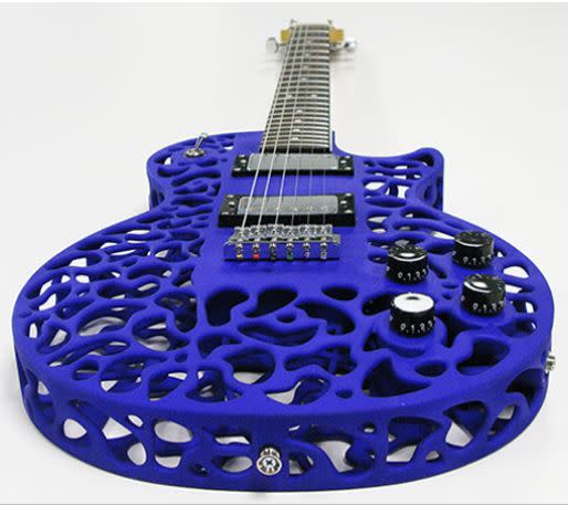 A guitar like no other, this Les Paul inspired guitar was printed by <a href="http://www.3dsystems.com/">3D Systems</a> using Selective Laser Sintering and is made of a strong type of Nylon. The guitar has a wooden inner core (different types of wood optional) that connects the neck to the bridge, making the tone of the instrument customizable in addition to other hardware customizing possibilities. <a href="http://www.odd.org.nz/buying.html">Find out how to buy yours here.</a> 