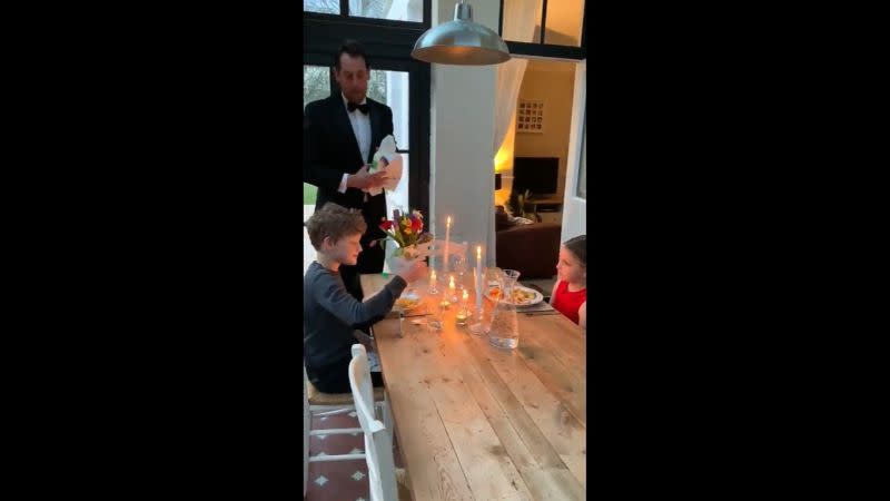 Ben Moore entertaining his children in his waiter role at their home amid the Covid-19 shutdown. — Picture via Twitter