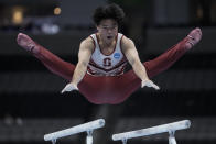 Asher Hong competes on the parallel bars during the U.S. Gymnastics Championships, Thursday, Aug. 24, 2023, in San Jose, Calif. (AP Photo/Godofredo A. Vásquez)