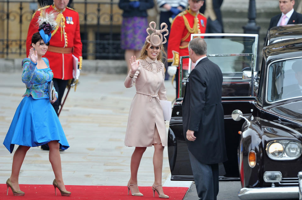 Princesses Beatrice and Eugenie were mocked for their unusual headgear at the 2011 royal wedding [Photo: Getty]