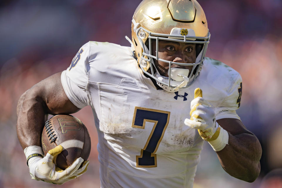 Notre Dame running back Audric Estime runs with the ball during the first half of an NCAA college football game against Clemson, Saturday, Nov. 4, 2023, in Clemson, S.C. (AP Photo/Jacob Kupferman)