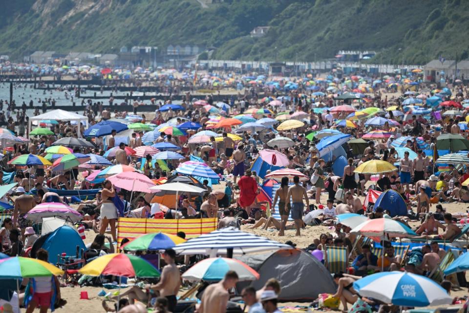 File photo: Crowds on a beach in Bournemouth during a heatwave (Getty)