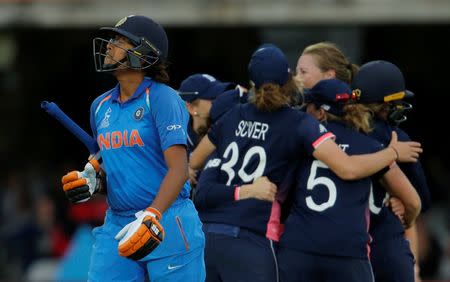 Cricket - Women's Cricket World Cup Final - England vs India - London, Britain - July 23, 2017 England's Anya Shrubsole celebrates with team mates after bowling out India's Jhulan Goswami Action Images via Reuters/Andrew Couldridge