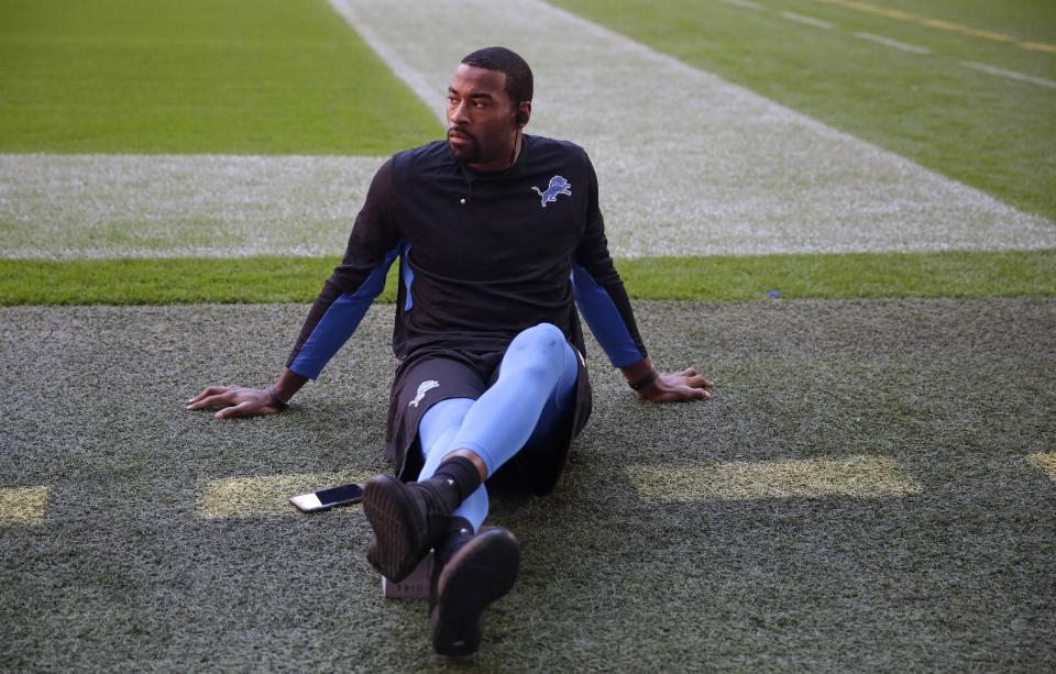 Detroit Lions wide receiver Calvin Johnson (81) stretches ahead of the NFL football game between Detroit Lions and Kansas City Chiefs Wembley Stadium in London,  Sunday, Nov. 1, 2015. (AP Photo/Matt Dunham)