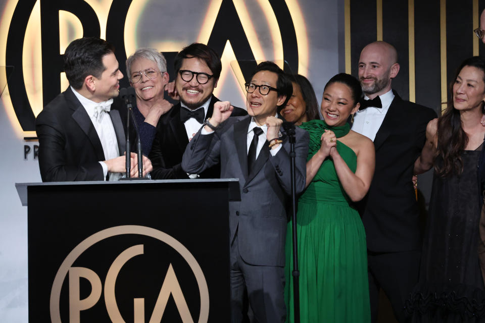Jonathan Wang, speaking, and the team from Everything Everywhere All at Once on stage at the 34th Annual Producers Guild Awards - Credit: John Salangsang/Invision for The Producers Guild of America/AP Images
