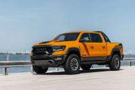 <p>Most monster trucks are confined to arenas and closed courses, but the 2022 Ram 1500 TRX is one that can be unleashed on public roads. Essentially the <a href="https://www.caranddriver.com/ram/1500" rel="nofollow noopener" target="_blank" data-ylk="slk:regular Ram 1500;elm:context_link;itc:0;sec:content-canvas" class="link ">regular Ram 1500</a> on steroids, the juiced-up TRX is dramatically wider and has a supercharged V-8 that generates 702 horsepower. Sure, there are mightier Hellcat-powered models, but no other stock pickup sounds like it ate a band of demons while sailing to 60 mph in just 3.7 seconds. The <a href="https://www.caranddriver.com/ford/f-150-raptor" rel="nofollow noopener" target="_blank" data-ylk="slk:450-hp Ford F-150 Raptor;elm:context_link;itc:0;sec:content-canvas" class="link ">450-hp Ford F-150 Raptor</a> is the TRX's only real challenger, but it's not a fair fight until the <a href="https://www.caranddriver.com/news/a35394861/2022-ford-f-150-raptor-r-confirmed/" rel="nofollow noopener" target="_blank" data-ylk="slk:700-plus-hp Raptor R;elm:context_link;itc:0;sec:content-canvas" class="link ">700-plus-hp Raptor R</a> arrives. Even then it'll have to contend with the Ram's ridiculously luxurious interior and remarkable on-road manners, which helped it <a href="https://www.caranddriver.com/features/a38260784/10best-2022-ram-1500/" rel="nofollow noopener" target="_blank" data-ylk="slk:earn a 10Best award;elm:context_link;itc:0;sec:content-canvas" class="link ">earn a 10Best award</a> and a place on our <a href="https://www.caranddriver.com/features/a38873223/2022-editors-choice/" rel="nofollow noopener" target="_blank" data-ylk="slk:Editors' Choice list;elm:context_link;itc:0;sec:content-canvas" class="link ">Editors' Choice list</a>. Living with the 2022 Ram TRX isn't all <em>Monster Jam</em>-worthy antics, though, because maneuvering in traffic or parking lots can cause anxiety and frequent fuel fill-ups will become a routine. Then again, no one ever said owning a monster is easy.<br></p><p><a class="link " href="https://www.caranddriver.com/ram/1500-trx" rel="nofollow noopener" target="_blank" data-ylk="slk:Review, Pricing, and Specs;elm:context_link;itc:0;sec:content-canvas">Review, Pricing, and Specs</a></p>