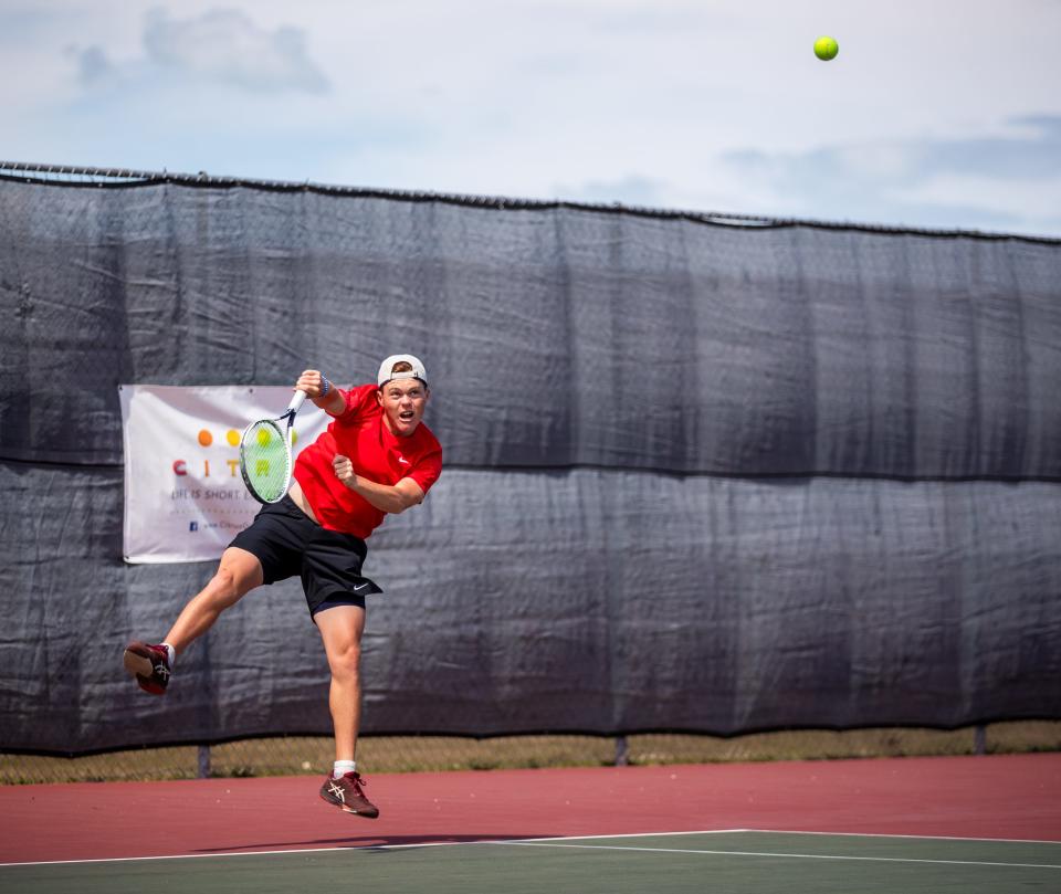 Vero Beach’s Mason Cisco serves against Windermere in the Region 4-4A high school tennis semifinals Tuesday, April 23, 2024, at Vero Beach High School.