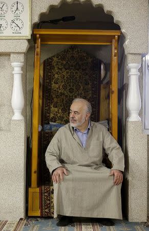 Hassani Abdelhadi, the imam of Attadamoun Mosque, attends the Friday prayer at the mosque in the neighbourhood of Molenbeek, in Brussels, Belgium, November 20, 2015. REUTERS/Youssef Boudlal