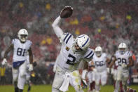 Indianapolis Colts quarterback Carson Wentz (2) celebrates after scoring against the San Francisco 49ers during the first half of an NFL football game in Santa Clara, Calif., Sunday, Oct. 24, 2021. (AP Photo/Tony Avelar)