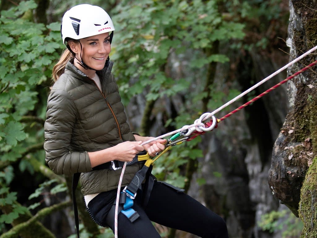 Britain's Catherine, Duchess of Cambridge, uses abseiling gear as she visits Royal Air Force (RAF) Air Cadets at their Windermere Adventure Training Centre near Ambleside in north west England (POOL/AFP via Getty Images)