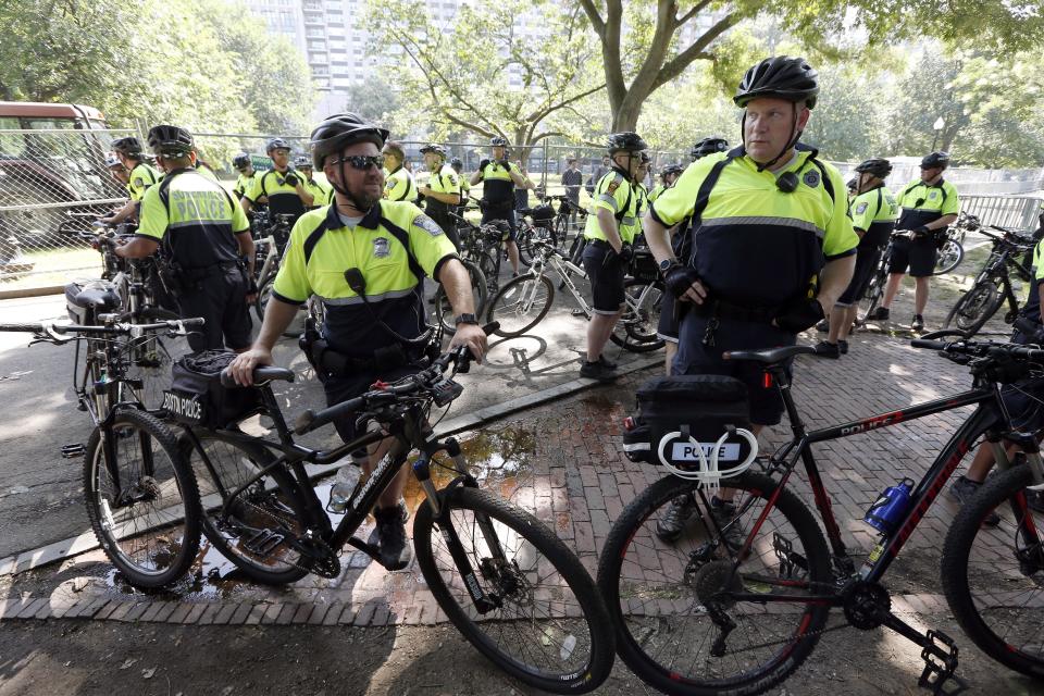 <p>Police wait with their bicycles before a planned “Free Speech” rally on Boston Common, Saturday, Aug. 19, 2017, in Boston. (Photo: Michael Dwyer/AP) </p>