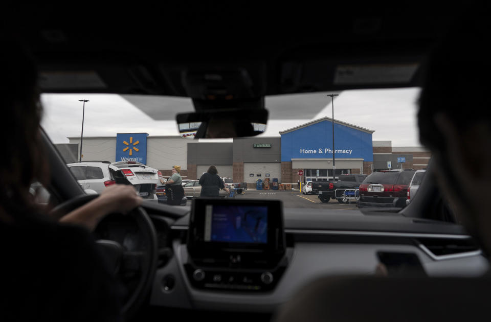 Jesse Johnson of the Family Resource Center drives a client to Walmart in Findlay, Ohio, Thursday, Oct. 12, 2023. Advocates in Hancock County say that transportation can be especially challenging for people in recovery, in part because they don't want to ask drug dealers for rides. (AP Photo/Carolyn Kaster)