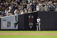 New York Yankees left fielder Aaron Hicks reacts after missing a catch on a RBI double hit by Tampa Bay Rays' Wander Franco during the fourth inning of a baseball game Friday, Sept. 9, 2022, in New York. (AP Photo/Adam Hunger)