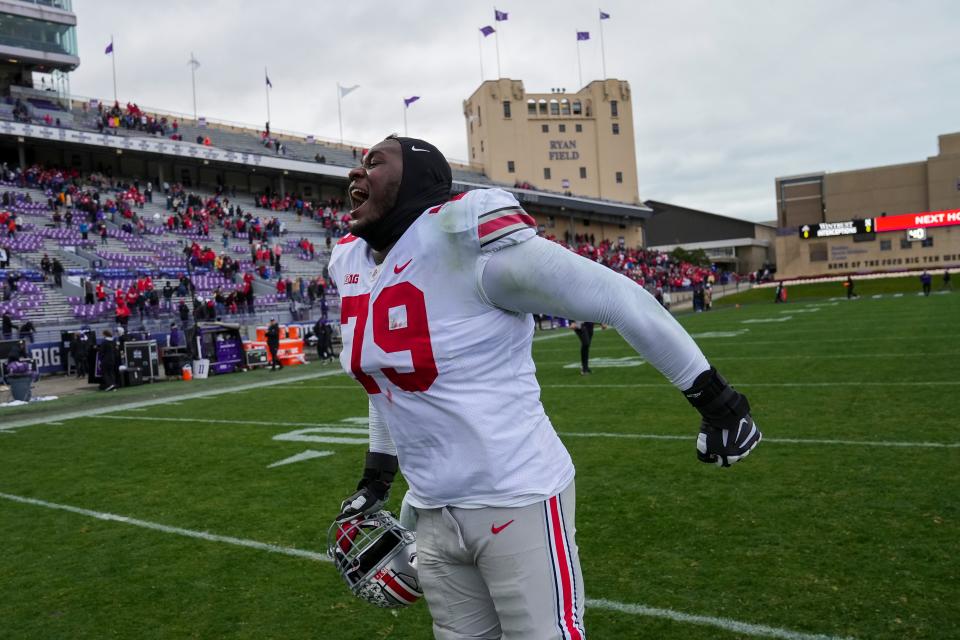 Nov 5, 2022; Evanston, Illinois, USA; Ohio State Buckeyes offensive lineman Dawand Jones (79) celebrates following the NCAA football game against the Northwestern Wildcats at Ryan Field. Ohio State won 21-7. Mandatory Credit: Adam Cairns-The Columbus Dispatch