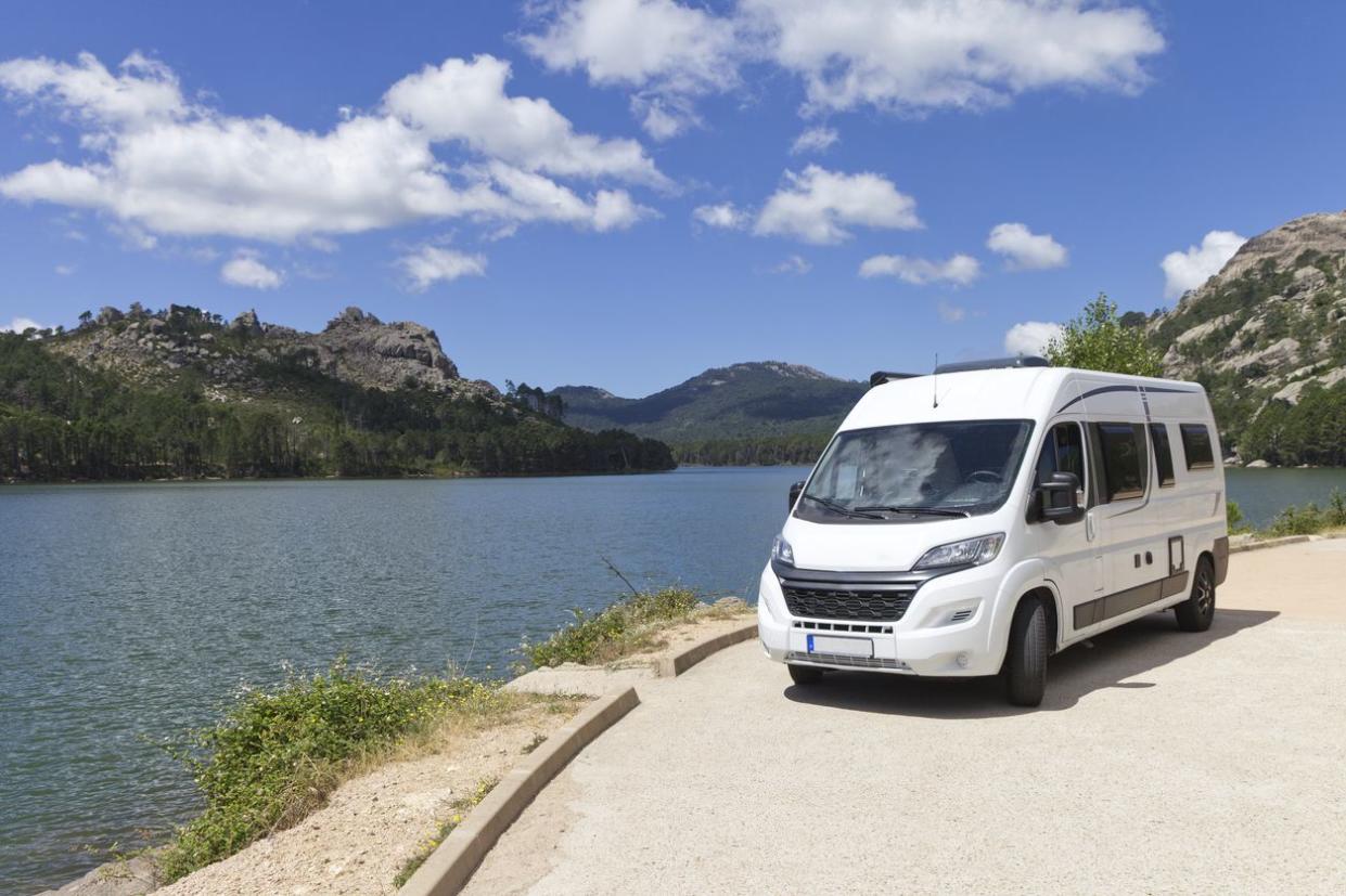 Motorhome parked next to water