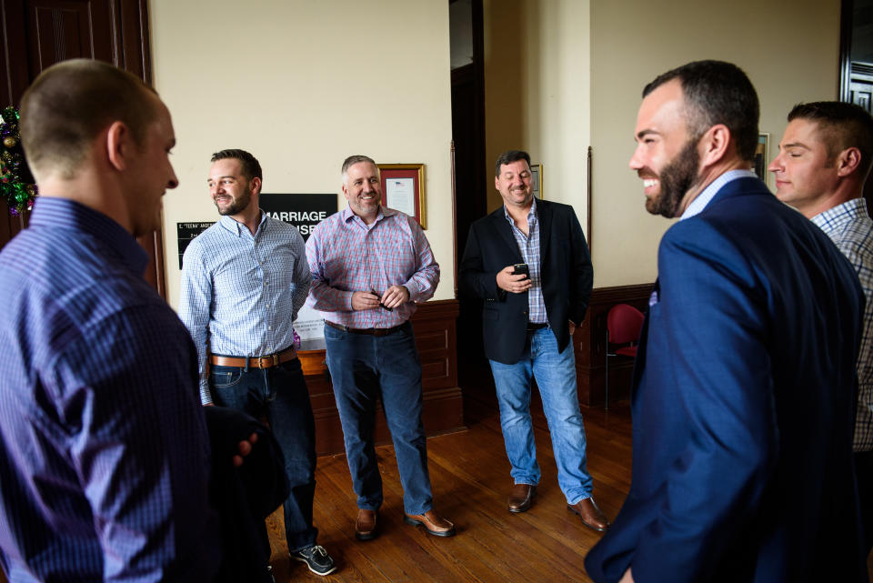 The grooms and their guests.