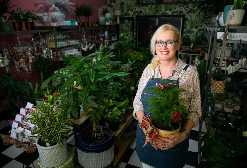 Days like Small Business Saturday, Erica des Roches said, “are so important, especially for small businesses. It can make or break you as a small business.” The owner of Veranda Plants & Gifts, pictured above in her store in December 2021, rents a shop tucked away in a breezeway on Miracle Mile.