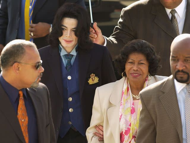 <p>Aaron Lambert-Pool/Getty</p> Michael Jackson and his mother Katherine Jackson arrive at the Santa Barbara County Courthouse for Michael Jackson's trial May 17, 2005.