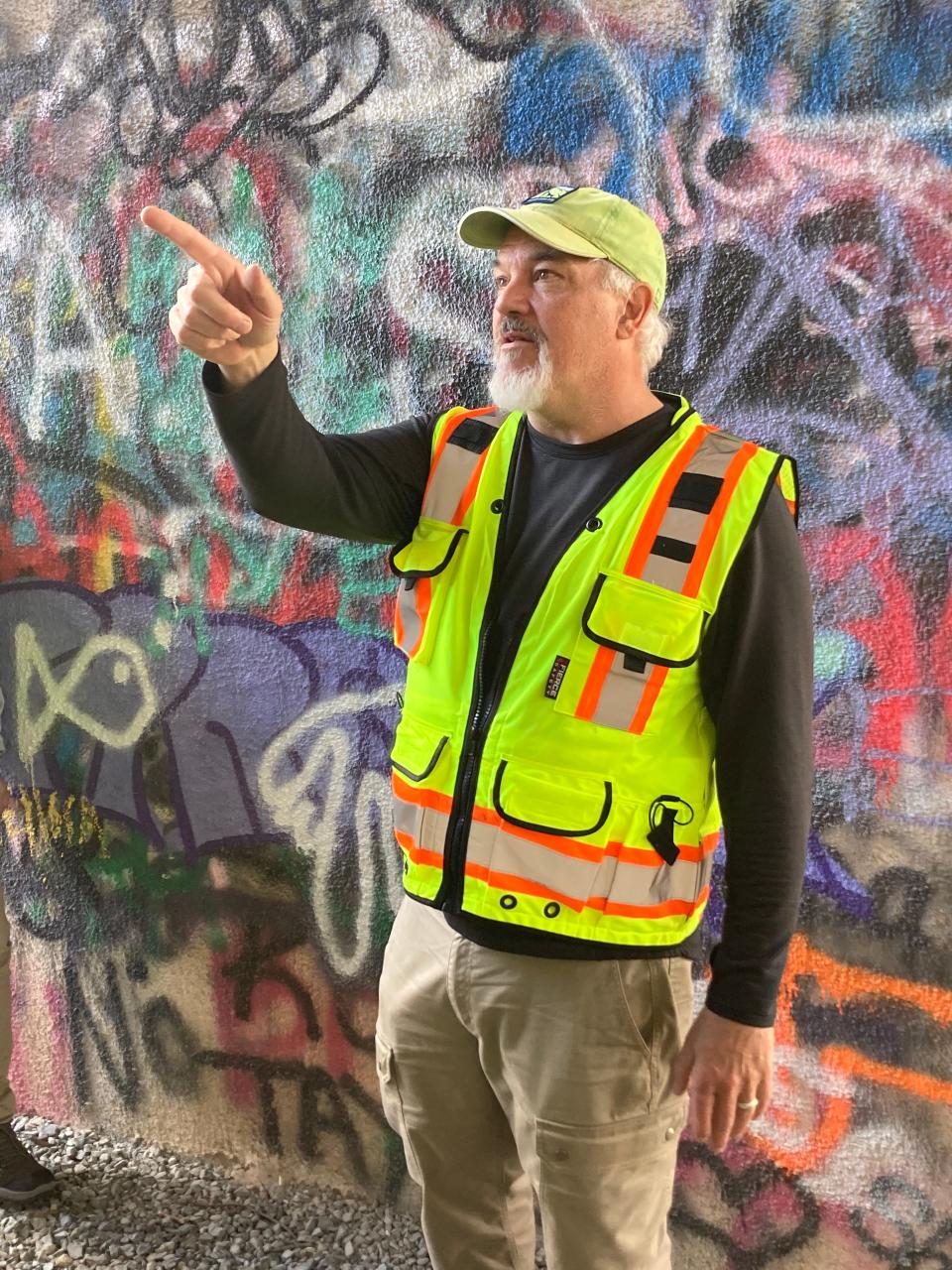 Jeff Hunter speaks about road ecology—how roads affect both nearby plants and animals—under the Bluffton Bridge on Interstate 40 near Hartford, Tennessee.