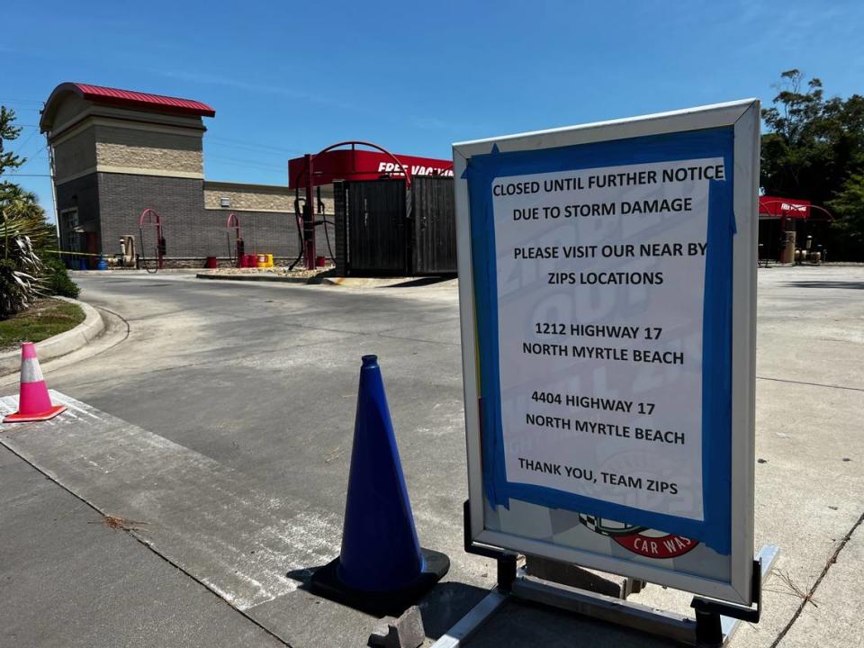 A sign announces the closing of a local Zips Car Wash. The business is located at 1604 Highway 17 North in North Myrtle Beach.