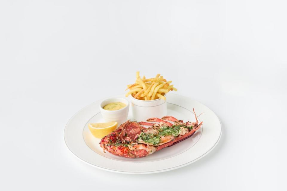 Grilled lobster with garlic butter, fries and béarnaise sauce at Chez Roux (Raffaella Bichiri)