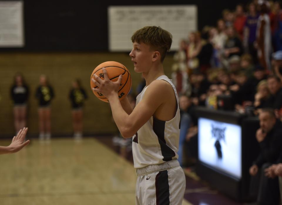 Griffen Shepherd surveys the Thunder defense. Shepherd scored a team-high 14 points for Pine View.