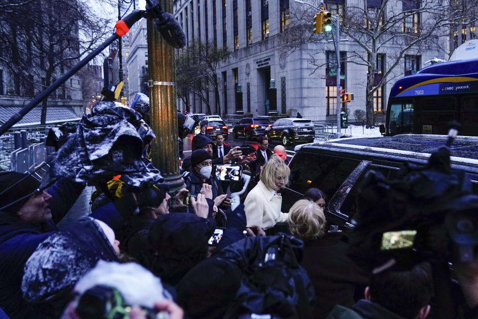 E. Jean Carroll, center, leaves Manhattan federal court following her defamation trial against former President Donald Trump, Tuesday, Jan. 16, 2024, in New York. (AP Photo/Frank Franklin II)