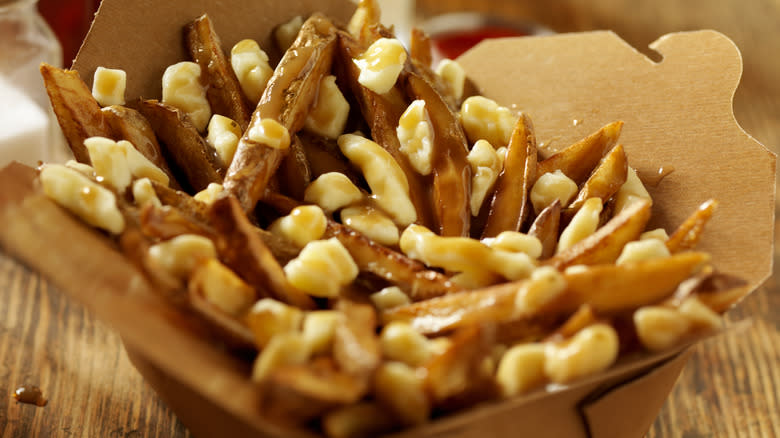 Box with poutine fries