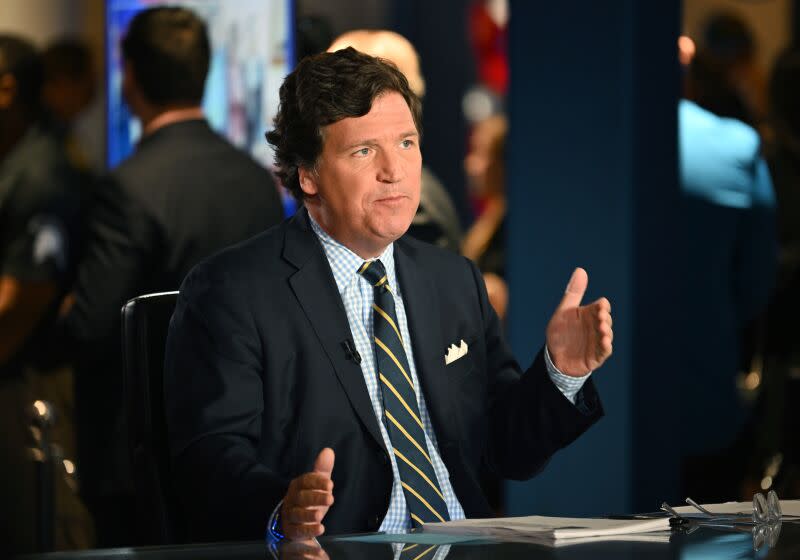 HOLLYWOOD, FLORIDA - NOVEMBER 17: Tucker Carlson speaks during 2022 FOX Nation Patriot Awards at Hard Rock Live at Seminole Hard Rock Hotel & Casino Hollywood on November 17, 2022 in Hollywood, Florida. (Photo by Jason Koerner/Getty Images)