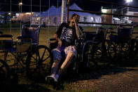 <p>Josh Phillips of Richland, Virginia, sits in a wheel chair as he waits to enter the Remote Area Medical Clinic in Wise, Va., July 21, 2017. (Photo: Joshua Roberts/Reuters) </p>