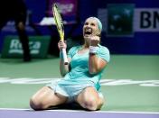 Tennis - Singapore WTA Finals Round Robin Singles - Singapore Indoor Stadium, Singapore - 26/10/2016 - Svetlana Kuznetsova of Russia celebrates after defeating Karolina Pliskova of Czech Republic. REUTERS/Edgar Su