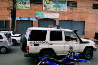 Officers of the Body of Scientific, Penal and Criminal Investigation (CICPC) drive past the Los Cotorros club where several people died when a person activated a tear gas grenade inside, according to Venezuela's interior minister Nestor Reverol, in Caracas, Venezuela June 16, 2018. REUTERS/Marco Bello