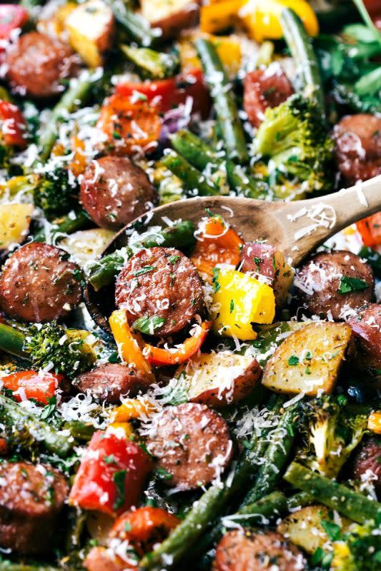 <p>Chelsea's Messy Apron</p><p>Roasted garlic-Parmesan veggies with sausage and herbs all made and cooked on one pan. 10 minutes prep, easy clean-up!</p><p><strong>Get the recipe: <a href="https://www.chelseasmessyapron.com/one-pan-healthy-sausage-and-veggies/" rel="nofollow noopener" target="_blank" data-ylk="slk:One-Pan Healthy Sausage and Veggies;elm:context_link;itc:0;sec:content-canvas" class="link ">One-Pan Healthy Sausage and Veggies</a></strong></p>