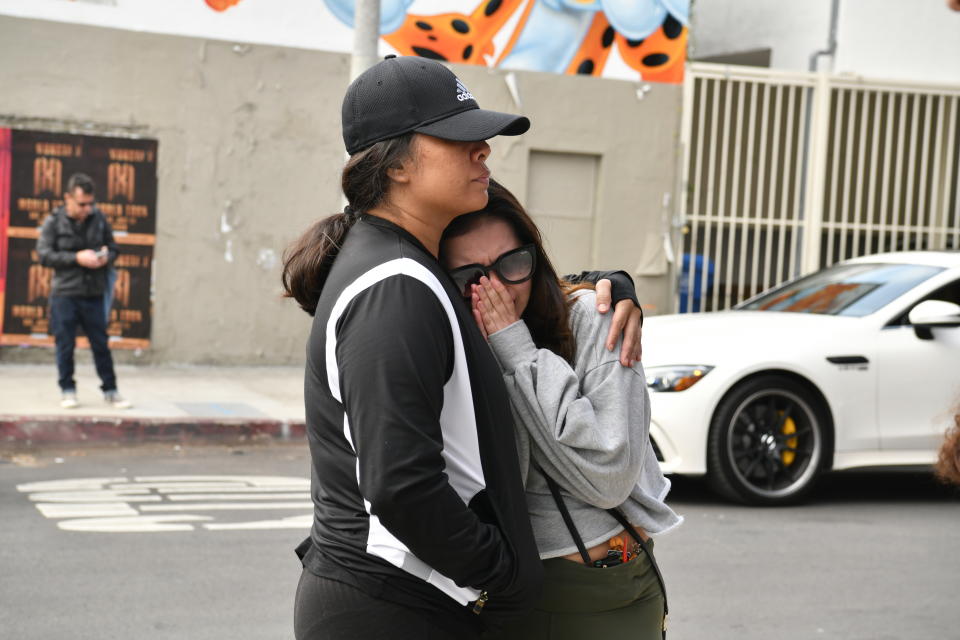 LOS ANGELES, CALIFORNIA - JANUARY 26: Fans are seen at a memorial next to a mural of Kobe Bryant on Melrose Avenue on January 26, 2020 in Los Angeles, California.  Bryant,  was a five-time NBA champion and a two-time Olympic gold medalist, was 41. (Photo by Rodin Eckenroth/Getty Images)